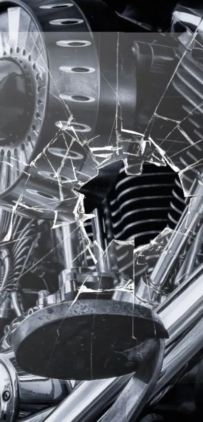 Detailed chrome motorcycle with shattered glass effect wallpaper.