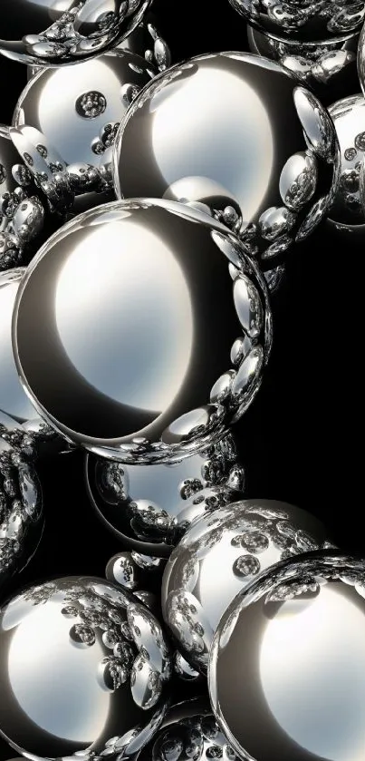 Chrome spheres on black background wallpaper.