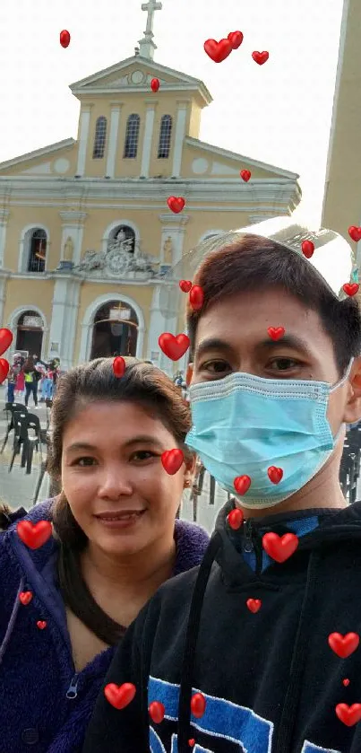 Selfie in front of a historic church building with a mask on.