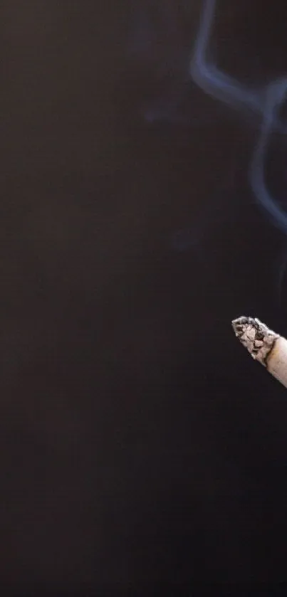 Hand holding a cigarette with smoke against a dark background wallpaper.