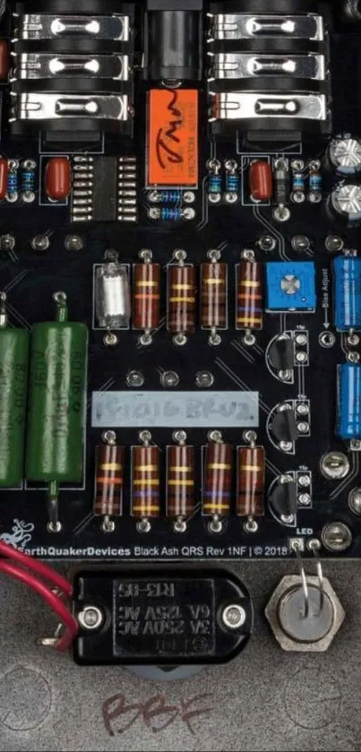 Close-up view of a detailed circuit board with colorful electronic components.