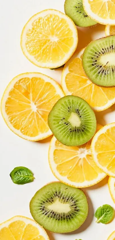 Vibrant lemon and kiwi slices wallpaper with green basil leaves.