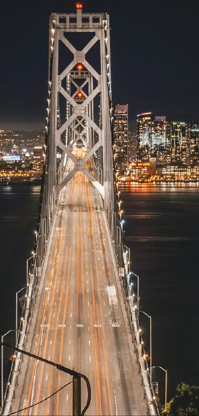 Stunning urban city bridge with sparkling night lights and a serene water reflection.