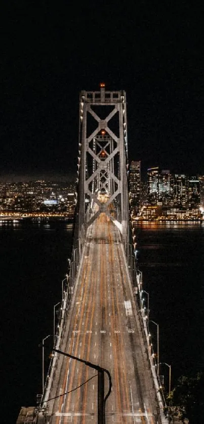 A stunning nighttime view of a city bridge with an illuminated skyline.