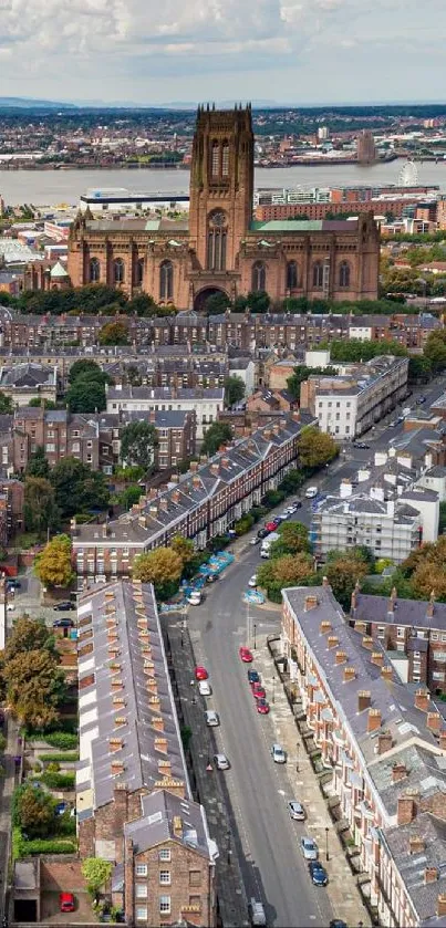 Aerial view of city with prominent cathedral and surrounding streets.