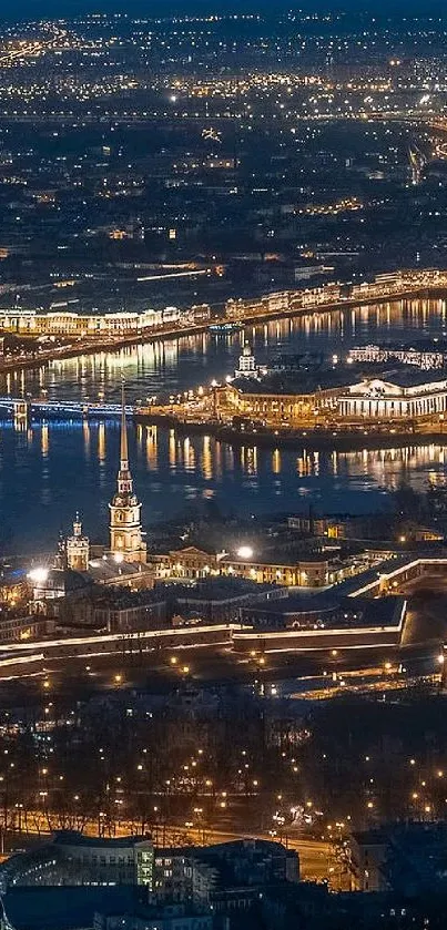 Aerial view of a city with twinkling lights at night, showcasing urban beauty.