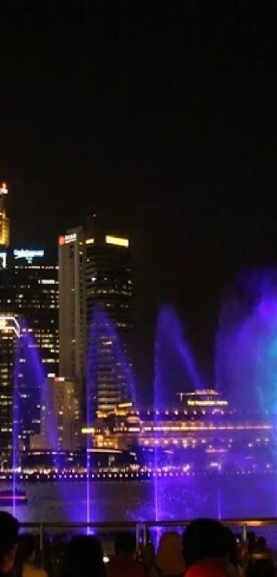 Dynamic city night scene with water light show and skyline background.