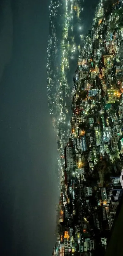 Aerial view of city lights at night creating a serene and vibrant cityscape.