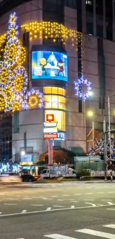 Festive city night with bright holiday lights illuminating the urban street.