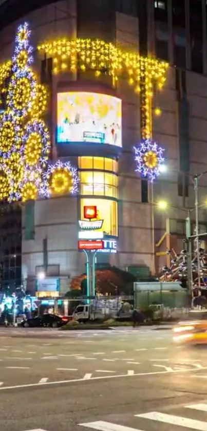 Night city street with festive Christmas lights and decorations.