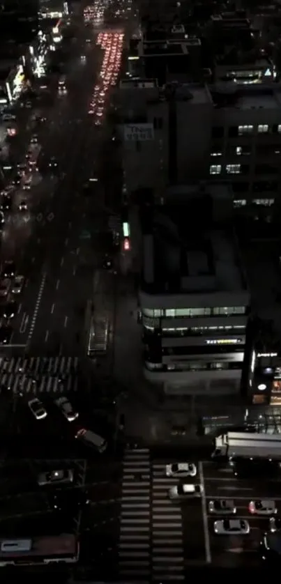 A bustling cityscape at night with illuminated streets and buildings.