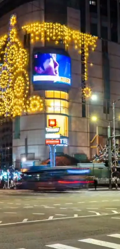 Night cityscape with bright holiday lights on urban building and streets.