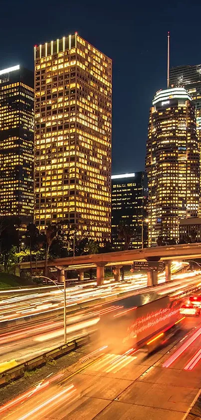 Nighttime cityscape with lit skyscrapers and busy street.