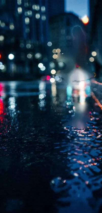 Blurry cityscape reflecting vibrant lights on wet street at night.