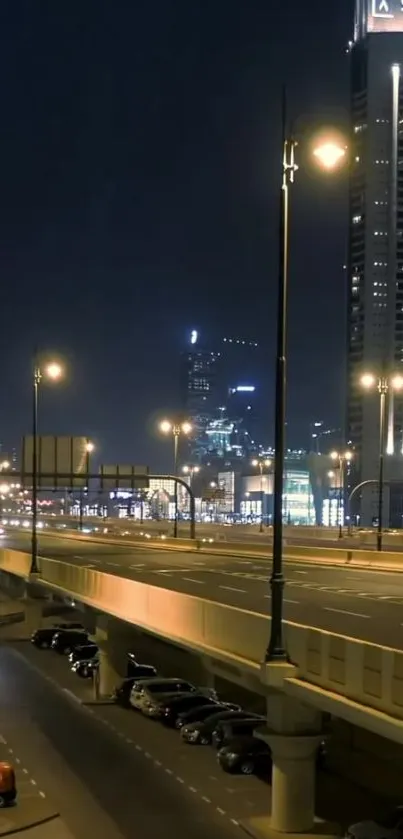 Nighttime cityscape with bright urban lights and towering skyscrapers.