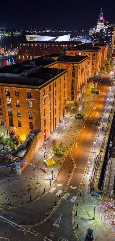 A vibrant city street view at night with bright lights and scenic buildings.