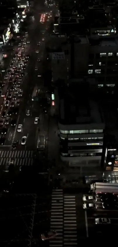 Night city traffic lights illuminating urban street.