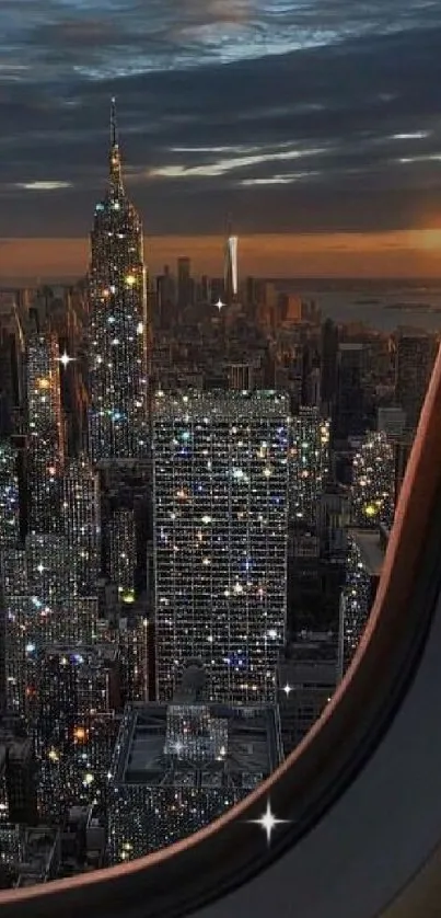 Aerial view of city skyline at night through airplane window.