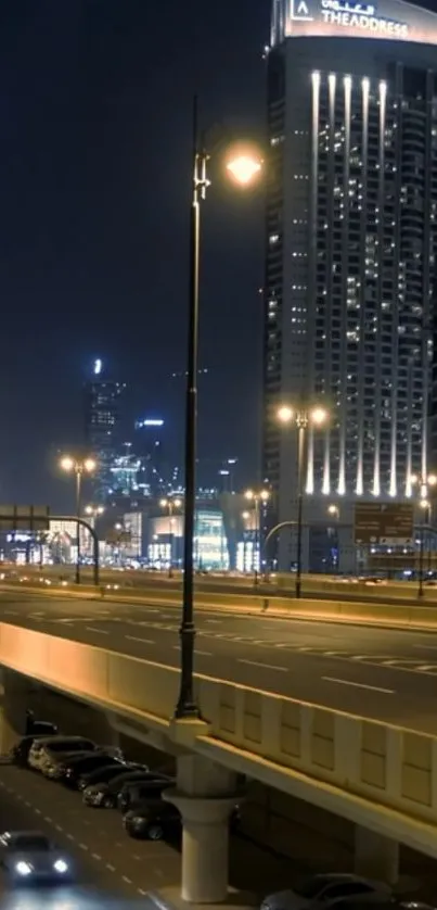 Night cityscape with illuminated skyscrapers and streets.