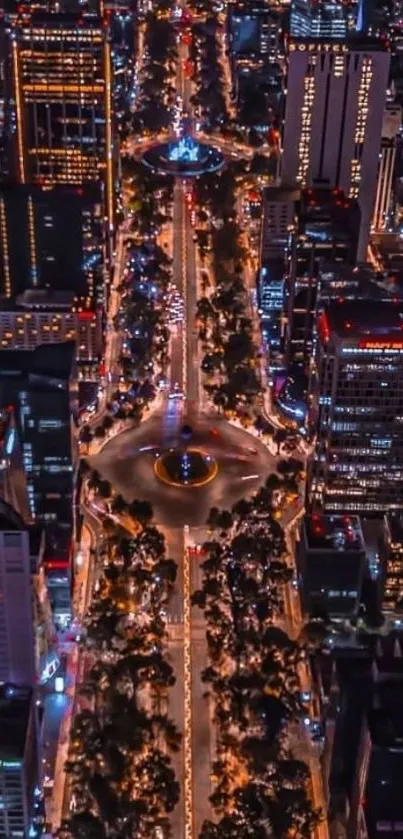 Aerial view of vibrant city nightscape with bright urban lights.