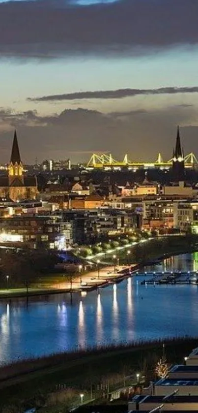 City nightscape with river and lights reflecting.