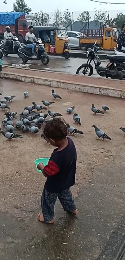 Child feeding pigeons in bustling city street.