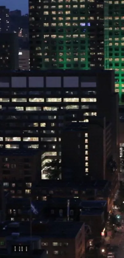 City skyline at night with illuminated skyscrapers and city lights, showcasing urban beauty.