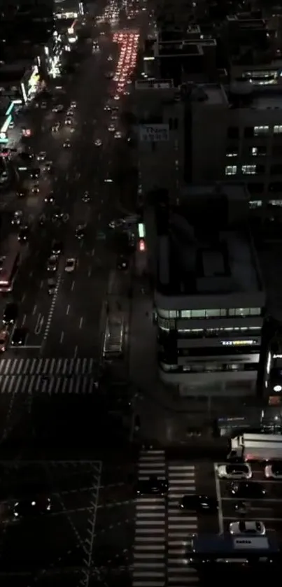 Nighttime aerial view of city streets.