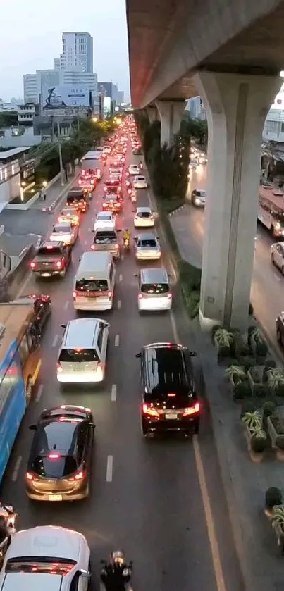 Evening city traffic jam under an urban bridge.