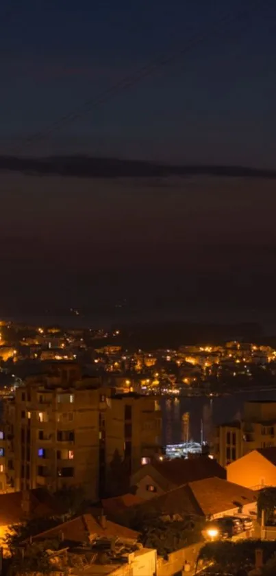 Serene cityscape at dusk with glowing lights and dark blue skyline.