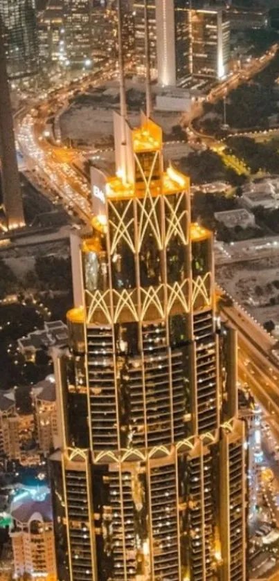 Mobile wallpaper of a cityscape featuring a brightly lit skyscraper at night.