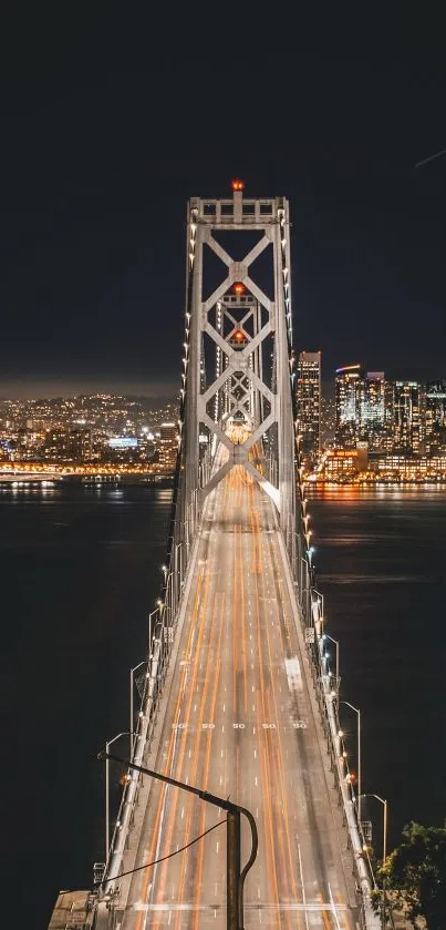 Night view of illuminated bridge over a cityscape with vibrant lights.