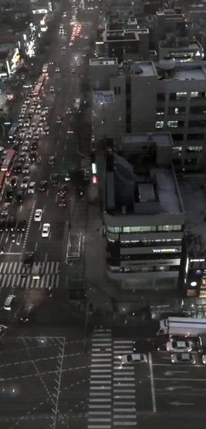 Aerial view of bustling city traffic at night in an urban landscape.