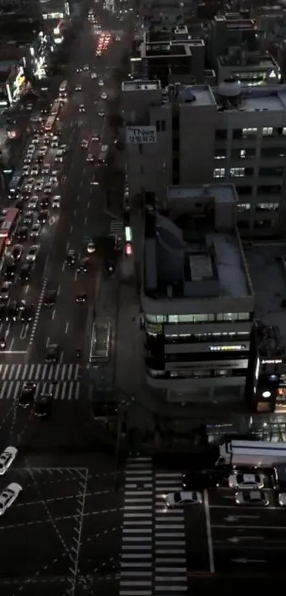 Aerial view of bustling city street at night.