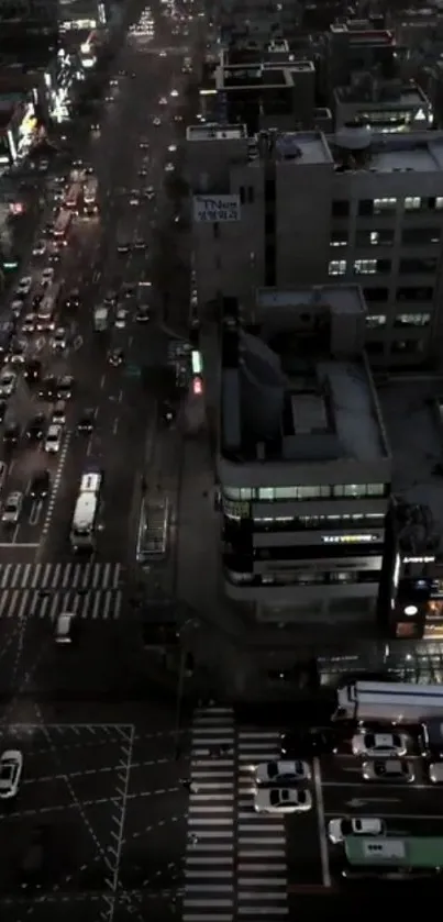 Aerial view of cityscape with night traffic lights.