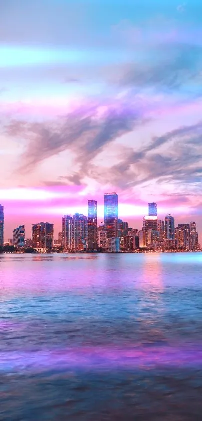 Skyline at sunset with pastel sky and water reflections.