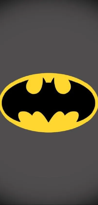 Dark gray wallpaper with Batman logo in yellow and black.