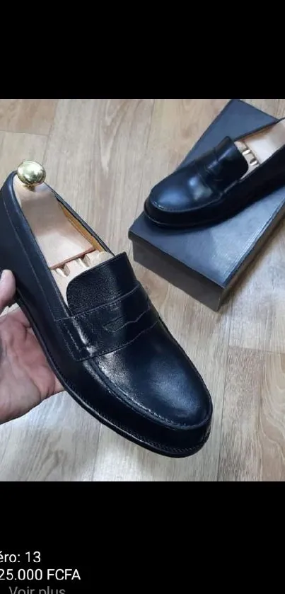 Classic black leather loafers with elegant design.