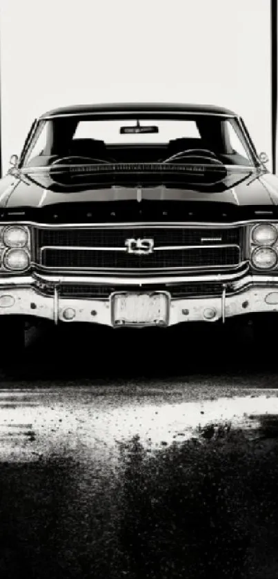 Monochrome wallpaper featuring a classic black muscle car, front view.