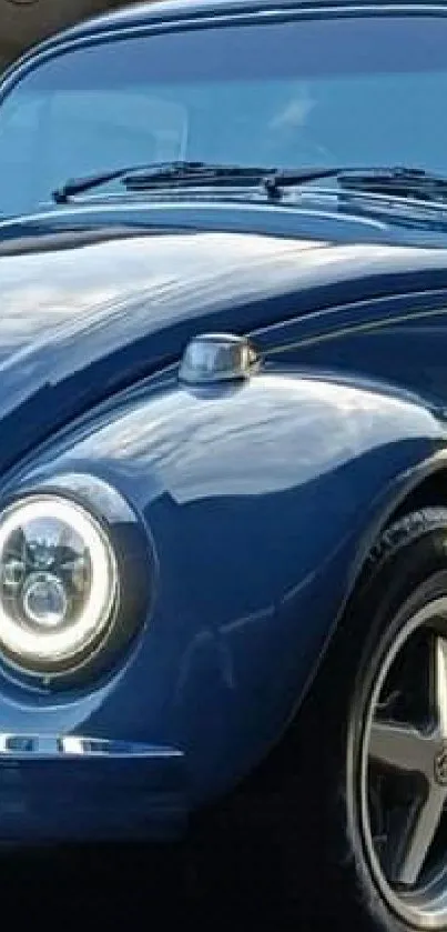 Classic blue Beetle car parked in an urban setting, showcasing its vintage style.