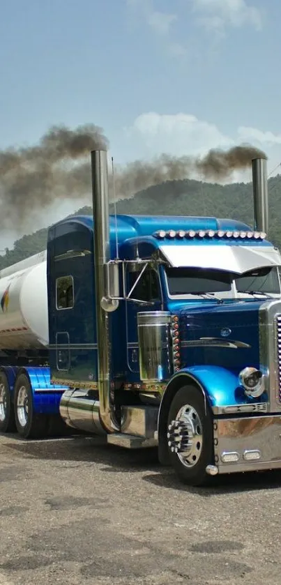 Classic blue truck with chrome details on road.