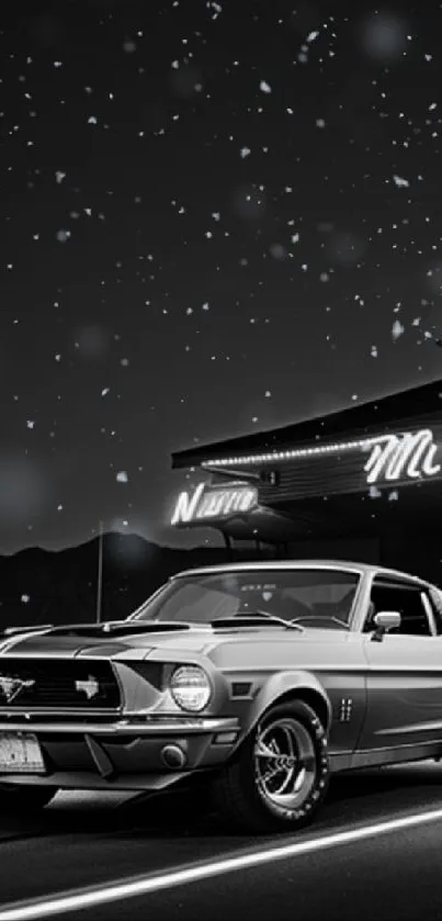 Black and white classic car under starry night sky.