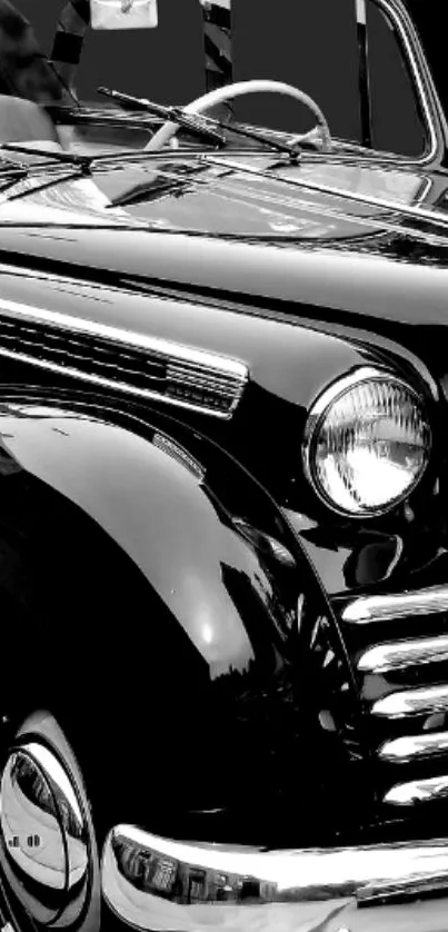 Black classic car wallpaper with elegant vintage design.