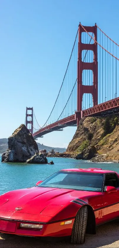 Red classic car with Golden Gate Bridge backdrop.