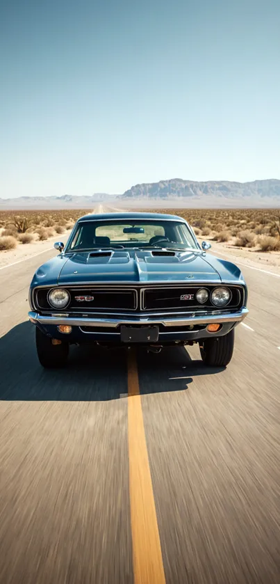 Classic muscle car driving through desert landscape.