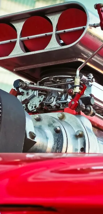 Close-up of classic car engine with vibrant red highlights.