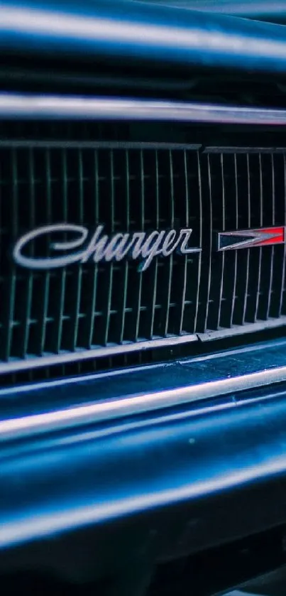 Mobile wallpaper of a classic car's front grill in dark blue tones.