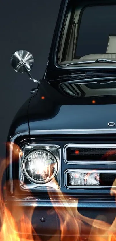 Front view of a classic vintage car on a dark background.