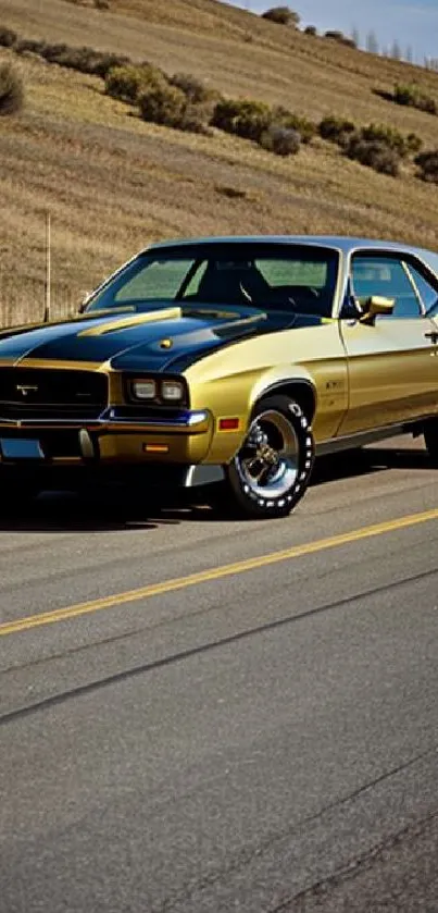 Vintage muscle car driving down a scenic open road.