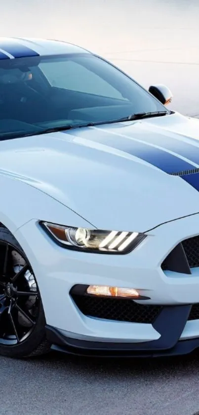 White sports car with blue stripes on a modern mobile wallpaper.